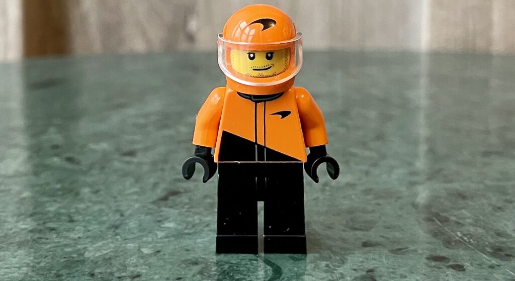 60442 f1 driver with mclaren race car 2